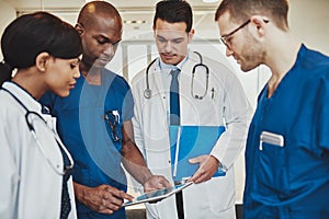 Team of multiracial doctors at hospital