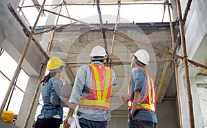 Team onsite of architecture inspector and discuss together photo