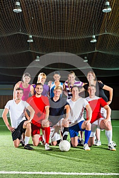 Team playing football or soccer sport indoor