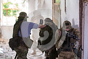 A team of professional airsoft players clear the location from opponents.