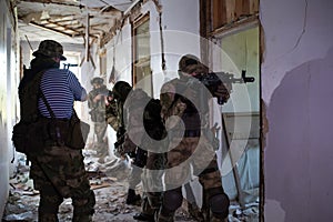 A team of professional airsoft players clear the location from opponents.