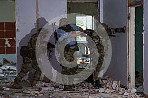 A team of professional airsoft players clear the location from opponents.