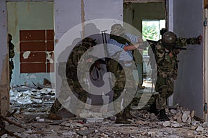 A team of professional airsoft players clear the location from opponents.