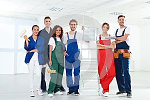 Team of professional painters with tools
