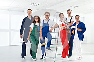Team of professional painters with tools