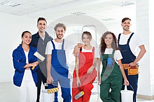 Team of professional painters with tools