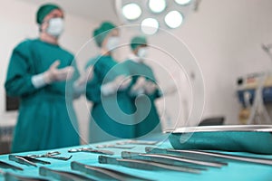 Team of professional surgeons performing operation in hospital