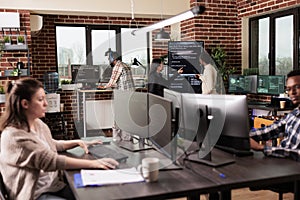 Team of programmers analyzing machine learning app code