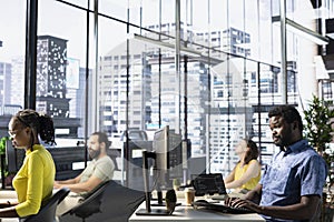 Team of programmers monitoring and maintaining company systems photo
