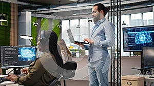 Team of programmers in office developing software applications using AI