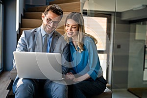 Team of programmers writing digital code in the metaverse and working together on the internet