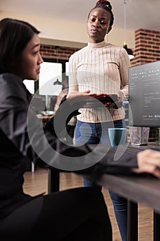 Team of software developers analyzing html code