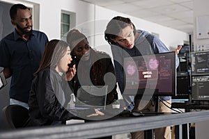 Team of software developers having web server hacked