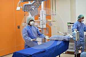 Team surgeon at work in operating room