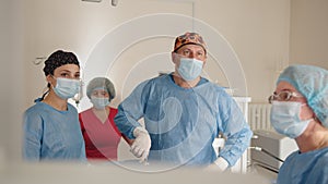 Team surgeon at work in operating room. Modern equipment in operating room. Medical devices for neurosurgery. Medical
