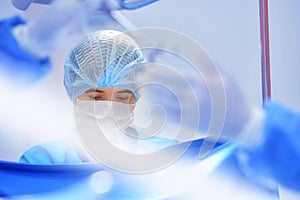 Team surgeon at work on operating room