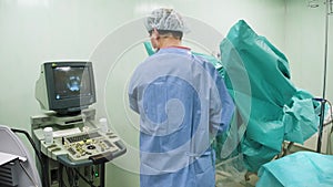 A team of surgeons in operating room during procedure. Creative. Medical technologies, concept of sickness.