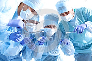 A team of surgeons at work in the operating room