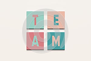 Team and teamwork in business or education concept. The word team on colorful square blocks