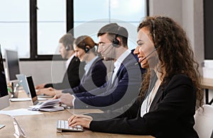 Team of technical support with headsets