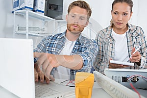 Team technicians working together at data centre