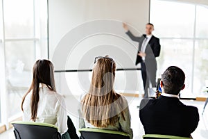 Team at training listen speaker