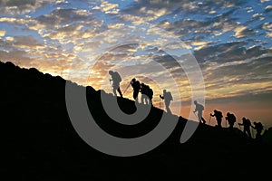 Trekkers and hikers at Sunrise twilight  photo