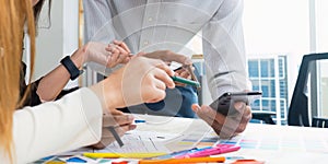 team of UI UX web designer are working together to develop mobile responsive websites with UI UX front end designer