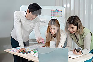 team of UI UX web designer are working together to develop mobile responsive websites with UI UX front end designer