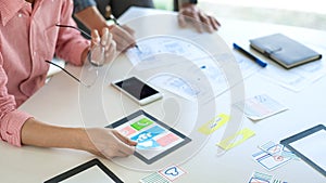 Team User experience UX designer creative graphic planning or designing application development a prototype for mobile phone or