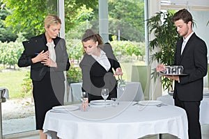 team waiters training at restaurant school