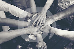 Team Work Concept : Group of Diverse Hands Together Cross Processing of young people in the nature