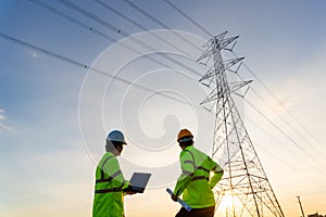 Team work of Engineers and Technician working inspections at the electric power station to view the planning work by producing