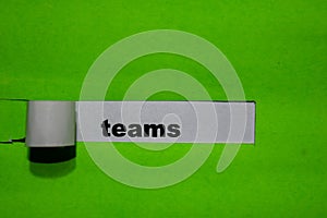 Teams, Inspiration and business concept on green torn paper