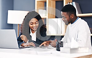 Teamwork, black woman and man at desk with tablet, laptop or paperwork for sharing ideas. Collaboration, opinion and