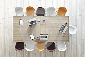 Teamwork and brainstorm concept with top view on wooden conference table with laptops and coffee mugs surrounded by white, brown