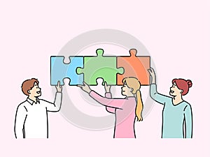 Teamwork business people putting together puzzle to jointly solve problem increasing company profits