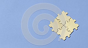 Teamwork and Business Solution Concept with Four Connected Puzzle Pieces