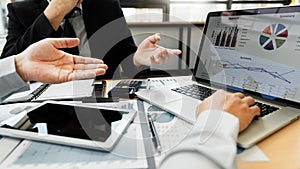 Teamwork company meeting concept, business partners working with laptop computer together analysing startup financial project