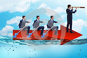 The teamwork concept with businessmen on boat