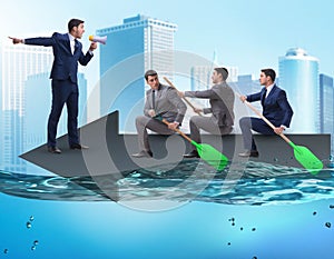 Teamwork concept with businessmen on boat