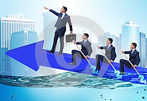 Teamwork concept with businessmen on boat