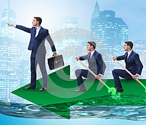 Teamwork concept with businessmen on boat