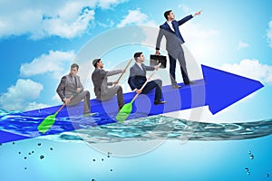 The teamwork concept with businessmen on boat