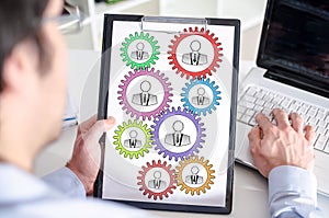 Teamwork concept on a clipboard