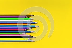 Teamwork concept. group of color pencil on yellow background with word Teamwork, Together, Everyone, Achieves and More photo