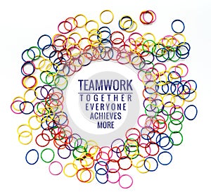 Teamwork concept. group of colorful rubber band on white background with word Teamwork, Together, Everyone, Achieves and More