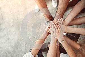 Teamwork concept, group of friends stack their hands