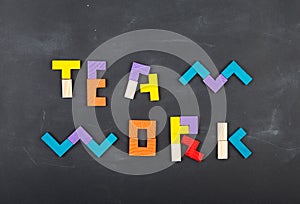 Teamwork creative concept concept jigsaw on the blackboard