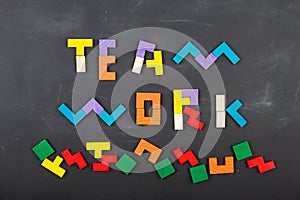 Teamwork creative concept concept jigsaw on the blackboard